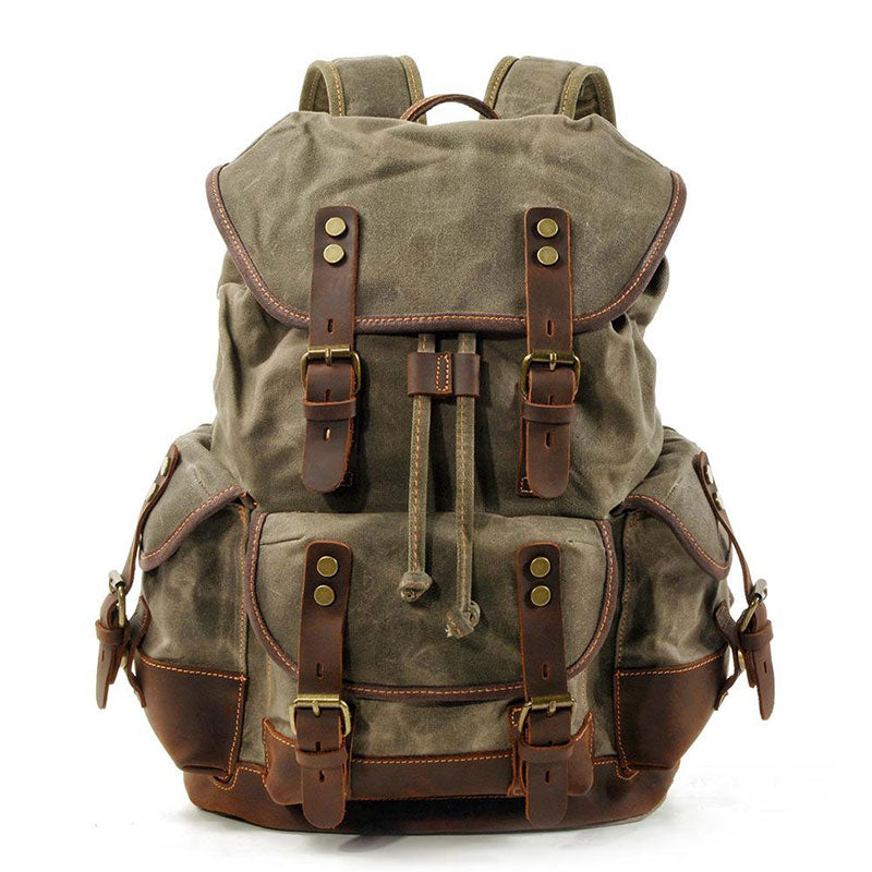 Waxed canvas backpack / rucksack with folded top and waxed canvas flap